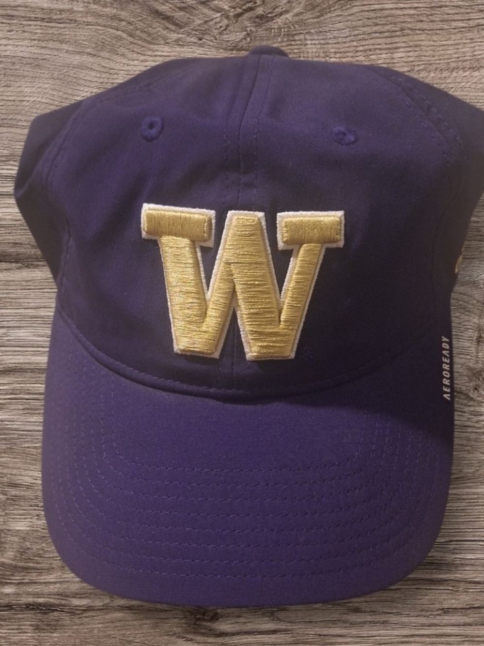Nike Women’s Purple Cap with Gold Embroidered W